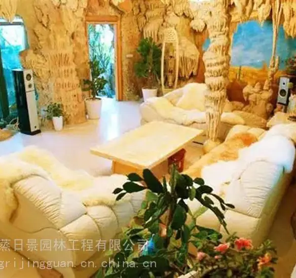 沈阳假山仿石山洞房制作,洞穴风民宿装修 水泥仿生溶洞主题酒店餐厅施工公司