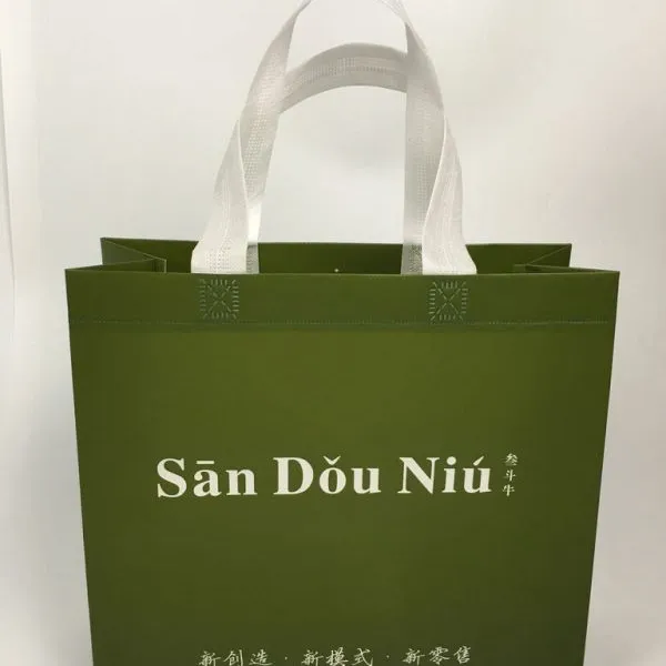 广州厂家直销淋膜腹膜无纺布袋高档礼品环保袋双手提袋服装购物袋立体袋