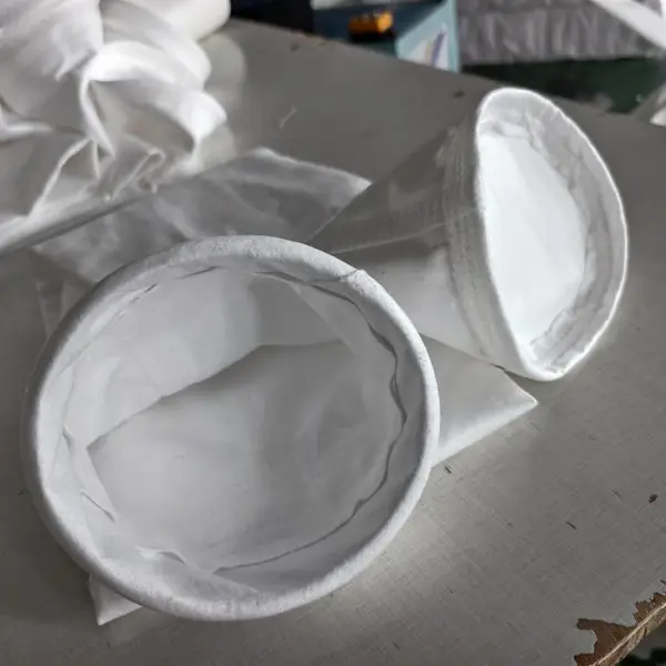 【鑫泉环保材料】聚四氟乙烯PTFE覆膜滤袋 城市垃圾收尘配套 除尘布袋规格齐全 鑫泉厂家