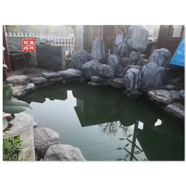 室外泰山石假山案例图-广东室外泰山石多少?广东吨位泰山石