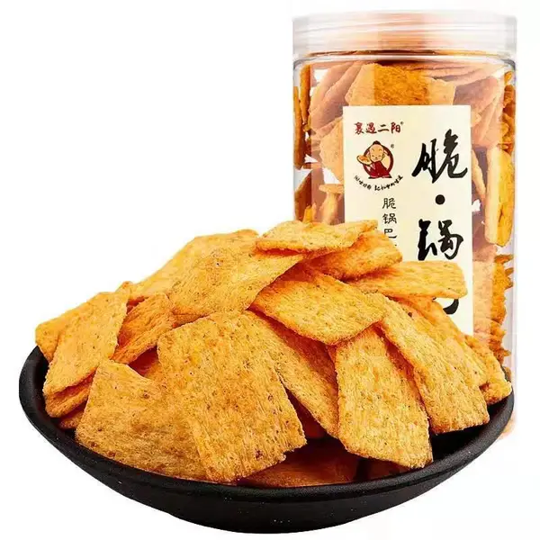 双螺杆膨化机锅巴设备,锅巴生产线、油炸膨化食品设备