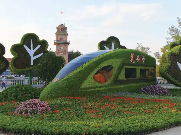 广西防城港新春快乐仿真植物墙仿真植物仿真绿雕工艺
