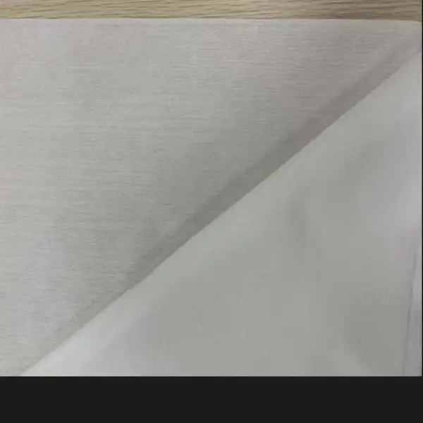 高突珍珠纹交叉水刺布 湿巾压缩毛巾原材料 粘胶涤纶水刺布源头厂家