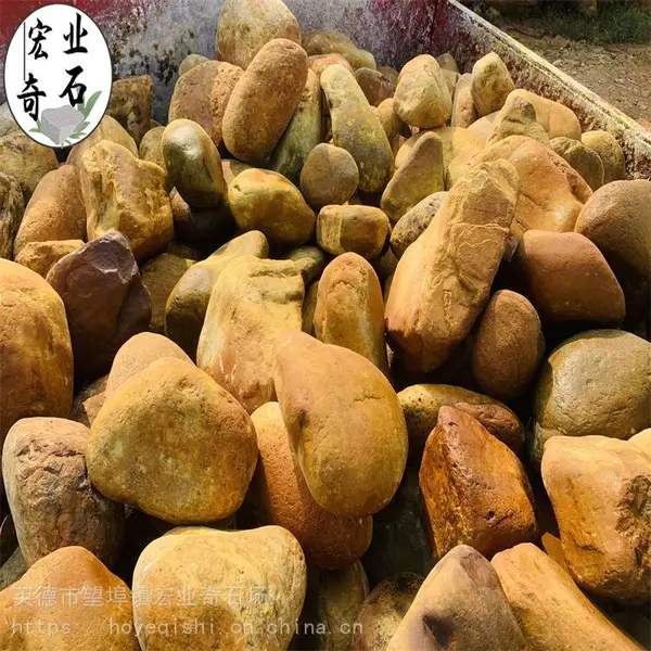 黄颜色的石材装车-湖南黄蜡石造景-公园园景假山石摆放