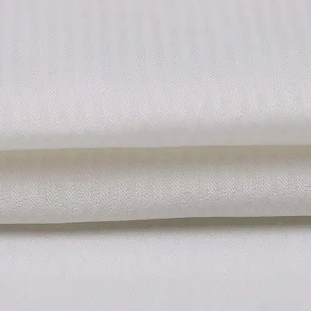 65/35涤棉混纺32*150D鱼骨纹漂白交织口袋布